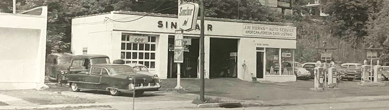old photo of a auto garage and gas station